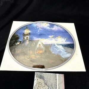 New Boxed Thomas Kinkade Suncather Light in the Storm Lighthouse Shore Oval